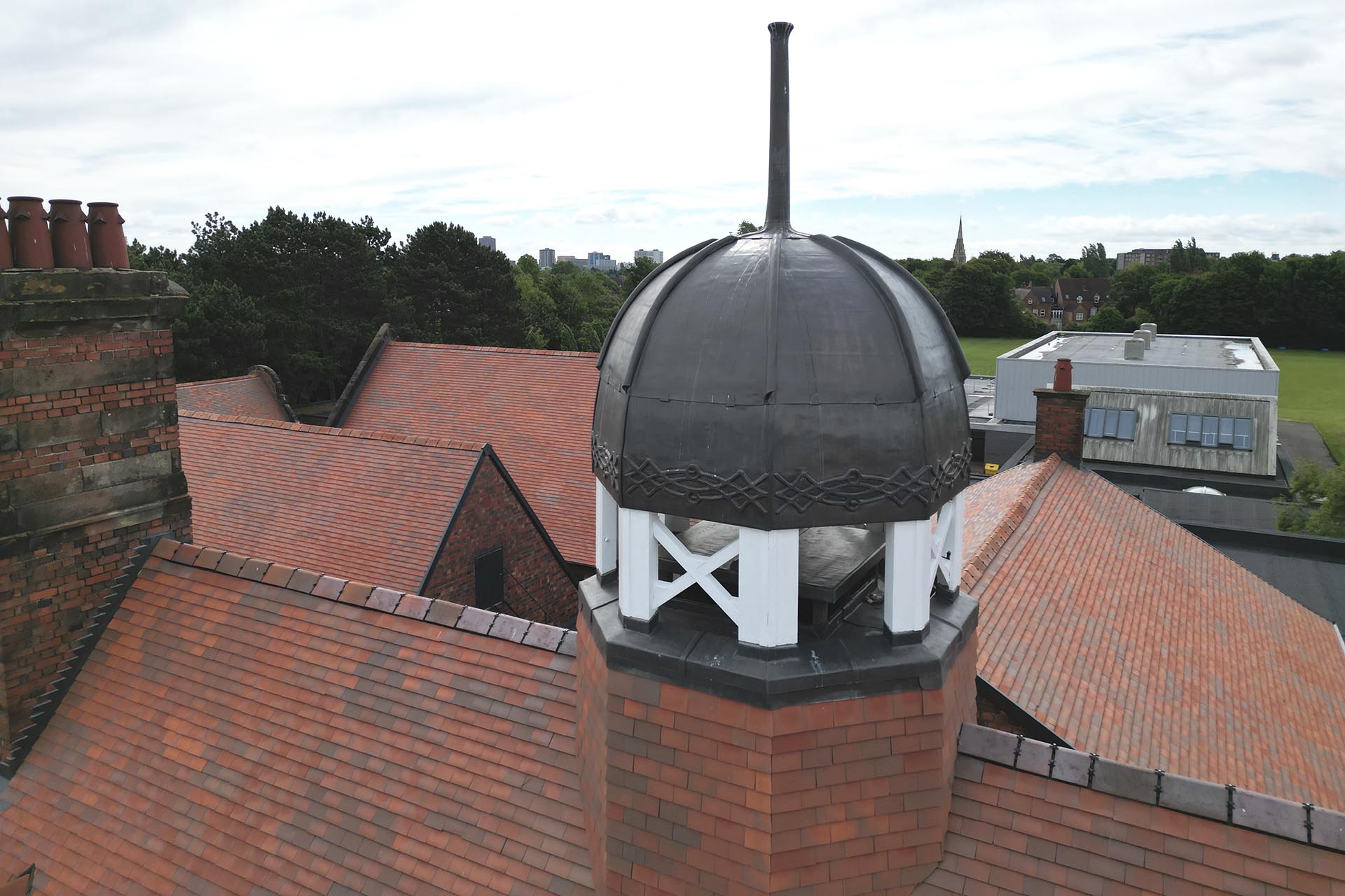 George Dixon Academy reroof by NRA Roofing using Dreadnought brown antique clay tiles